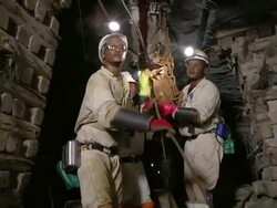MS LA Shot of Miners working underground / Johannesburg, Gauteng, South Africa Stock Footage