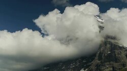 Eiger North Face - Timelapse of flowing clouds Stock Footage