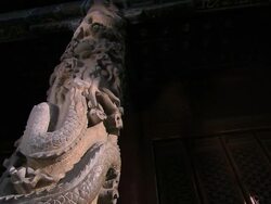 MS PAN LA Shot of pillar that has dragon pattern sculpture in relief in Confucius Temple / Qufu, Shandong Province, China Stock Footage