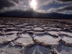 WS LA POV View of Dry  Cracked Earth and Salt Flats / Death Valley NP, California, United States  Stock Footage