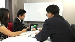 Dolly shot HD: Business Team Working with Financial graph analysis Stock Footage