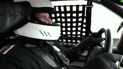 Stock-car driver shifts gears Stock Footage