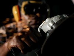 HD SLOW MOTION: Construction Worker Using A Circular Saw Stock Footage