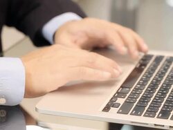 Businessman hands busy using laptop at office desk. Stock Footage