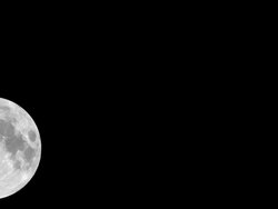 Full moon with clouds that obscure Stock Footage