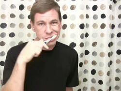 Couple brush teeth and kiss Stock Footage