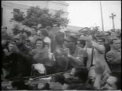 B/W 1959 Fidel Castro in crowd of people clapping outdoors / post-revolution Havana / newsreel Stock Footage