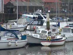 Leisure and Fishing boats in Whitby harbour News Clip