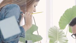 Design professionals reviewing blueprints Stock Footage