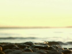Waves Splashing Over Smooth Rocks Stock Footage