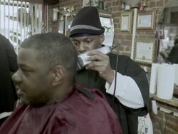 R/F MS Customer having haircut done in barbershop, Brooklyn, New York City, New York State, USA Stock Footage
