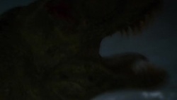 A Tyrannosaurus Rex and a triceratops tangle on a field in a computer generated animation. Stock Footage