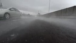 Car driving at rainy day - 4K - rear view Stock Footage
