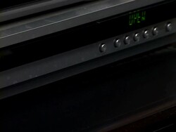 Dvd disc into player Stock Footage