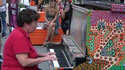 TIFF, Toronto International Film Festival: People Playing Piano in Festival Street Stock Footage