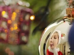 boy decorates a Christmas tree Stock Footage