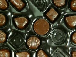 Eating a box of Chocolates. HD Stock Footage