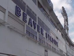 Shot of the Beaver Stadium sign at Pennsylvania State University. Shot pulls out revealing more of the sign Stock Footage