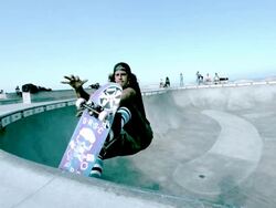 WS SLO MO Shot of skateboarder doing Madonna aerial in skate park bowl / Venice, California, United States Stock Footage