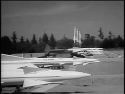 B/W 1955 SIDE VIEW Nike missile being raised / other missiles in background / near Seattle, WA / newsreel Stock Footage