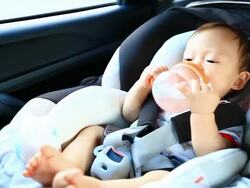 HD:Portrait of little baby in safety carseat. Stock Footage