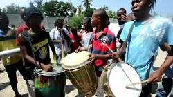 CLEAN : Haitians rally to mark St Jean Bosco massacre anniversary News Clip