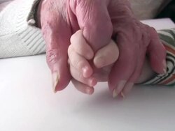 Young holding old hands 'Generation' Stock Footage