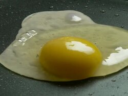 CU, Egg frying on pan, Atlanta, Georgia, USA Stock Footage