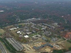 WS AERIAL View of Meridith College, Raleigh with wooded area / North Carolina, United States Stock Footage