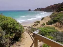 WS Shot of Path leading down to beach in front of Aireys Inlet lighthouse / Aireys Inlet, Victoria, Australia Stock Footage