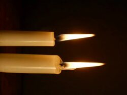 T/L two candles burning down (this shot is supplied as 3872x2592 still frames) Stock Footage