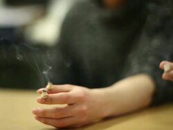 Oriental doctor apply moxibustion at the patient arm Stock Footage