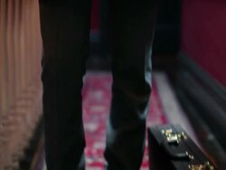Young man wearing fedora with briefcase Stock Footage