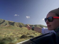 Woman enjoys car ride Stock Footage