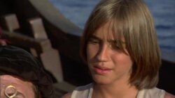 Christopher Columbus squints up at a quadrant as a young boy stands nearby. Stock Footage