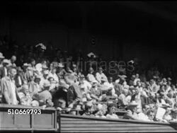 1950: BASEBALL: WS Spring Training exhibition game stands filled w/ fans, people. MS Cleveland Indians manager Al Lopez in jacket, cap, sunglasses. Instructional Video