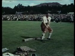 Eventful Britain Archive: Throwing the hammer, Braemar Games, Scotland, United Kingdom. 1958. Stock Footage