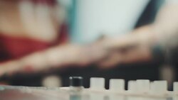 Tattoo artist tattooing young woman Stock Footage