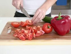 Slicing tomatos Stock Footage