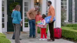 Grandfather hugs grandsons and daughter-in-law, surprised by how much teen boy has grown Stock Footage