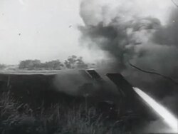 MS Soldier, barrel of machine gun shooting, shot down nazi plane, Soviet artillery, Russian soldiers moving guns, running in crawl in grass AUDIO / Russia  Stock Footage