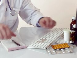 Doctor consulting with patient at desk Stock Footage