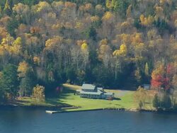 WS ARIEAL View of House on bank of Flagstaff lake  / Maine, United States Stock Footage