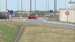 Security fencing and traffic outside the port of Calais News Clip
