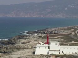 AERIAL WS Lighthouse on far western edge of Parque Natural de Sintra-Cascais / Cascais, Lisbon, Portugal Stock Footage