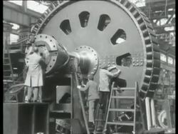 Dynamos built of steel; for generating electrical power, UK 1939 Stock Footage