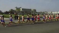 CLEAN : High-fives and presidential portraits at Pyongyang Marathon News Clip