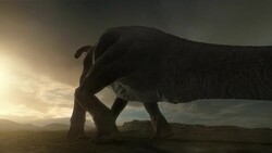 A large dinosaur lays eggs on a wide plain in a computer generated animation. Stock Footage