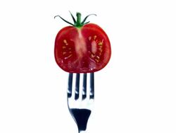 SLICED CHERRY TOMATO ROTATING ON FORK-LOOPED-1080HD Stock Footage