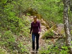 Woman hiking on trail Stock Footage